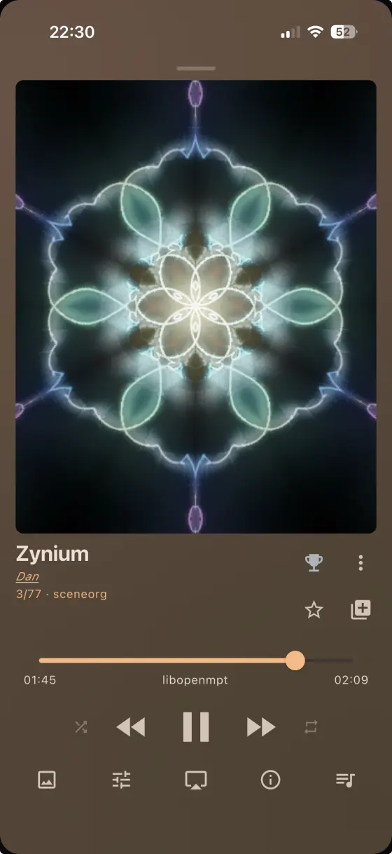 rewamp on iPhone — a Milkdrop (projectM) preset running fullscreen over the player
